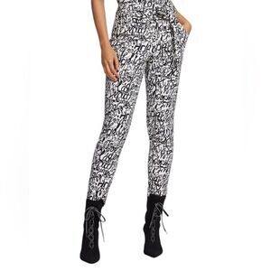New York & Company Black & White Graffiti Self Tie
Dress Pants (Size 4)